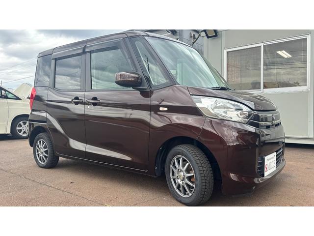 eKスペース G 車検整備2年付き PW 電動格納ドアミラー Wエアバッグ スマキー リヤビューカメラ アルミホイール 盗難防止システム エアコン ETC PS ベンチシート ABS キーレスエントリー 4wd(3枚目)