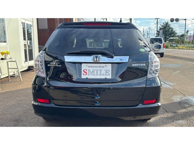 フィットシャトルハイブリッド ハイブリッド 検9年1月 キーレスキー エアコン ESC 運転席助手席エアバック パワーステアリング クルコン ABS イモビライザー 衝突安全ボディ 電動格納ミラー ETC SDナビ DVD視聴 ワンセグ(6枚目)