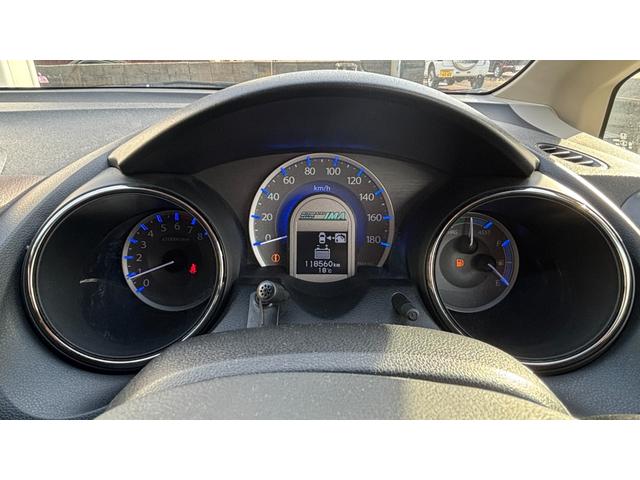 フィットシャトルハイブリッド ハイブリッド 検9年1月 キーレスキー エアコン ESC 運転席助手席エアバック パワーステアリング クルコン ABS イモビライザー 衝突安全ボディ 電動格納ミラー ETC SDナビ DVD視聴 ワンセグ(10枚目)