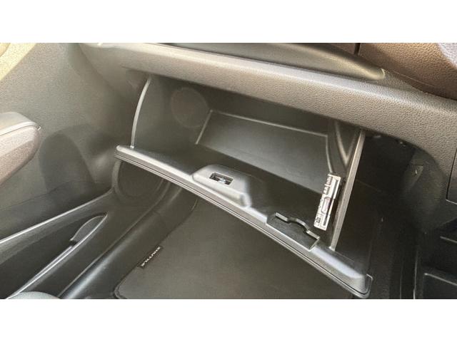 フィットシャトルハイブリッド ハイブリッド 検9年1月 キーレスキー エアコン ESC 運転席助手席エアバック パワーステアリング クルコン ABS イモビライザー 衝突安全ボディ 電動格納ミラー ETC SDナビ DVD視聴 ワンセグ(15枚目)