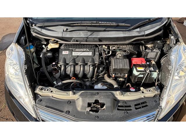 フィットシャトルハイブリッド ハイブリッド 検9年1月 キーレスキー エアコン ESC 運転席助手席エアバック パワーステアリング クルコン ABS イモビライザー 衝突安全ボディ 電動格納ミラー ETC SDナビ DVD視聴 ワンセグ(31枚目)