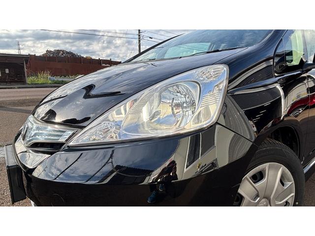 フィットシャトルハイブリッド ハイブリッド 検9年1月 キーレスキー エアコン ESC 運転席助手席エアバック パワーステアリング クルコン ABS イモビライザー 衝突安全ボディ 電動格納ミラー ETC SDナビ DVD視聴 ワンセグ(33枚目)