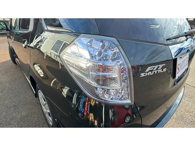 フィットシャトルハイブリッド ハイブリッド 検9年1月 キーレスキー エアコン ESC 運転席助手席エアバック パワーステアリング クルコン ABS イモビライザー 衝突安全ボディ 電動格納ミラー ETC SDナビ DVD視聴 ワンセグ(39枚目)