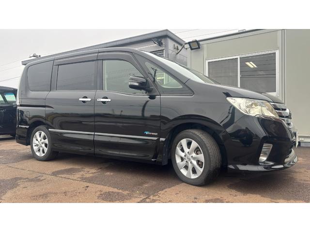 セレナ ハイウェイスター　Ｓ－ハイブリッド　車検整備２年付　ＡＳＴＯＰ　スマートキー　地デジテレビ　電格ミラー　Ｗエアコン　ＳＤ　衝突安全ボディ　寒冷地仕様　３列シート　フルフラットシート　オートクルーズ　セキュリティ　ウォークスルー　Ｂカメラ（3枚目）