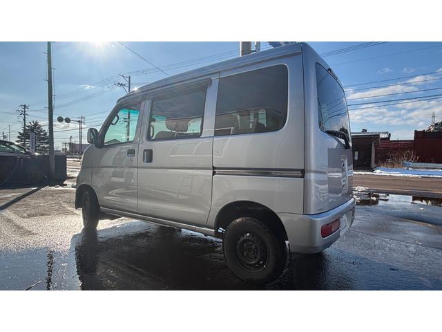 ハイゼットカーゴ クルーズ 検9年8月 切替4WD 全席パワーウインドウ 両側スライド 運転席助手席エアバック PS ABS エアコン付き ナビ・TV SD 運転席エアバック フルセグTV DVD ブルートゥース 電格ミラー付き(7枚目)