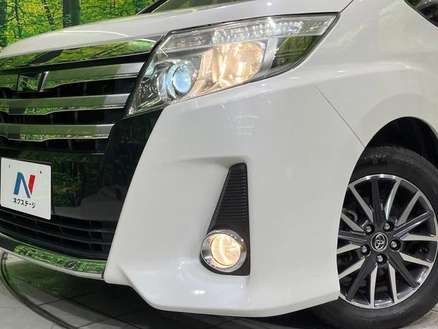 ノア Ｓｉ　４ＷＤ　両側電動スライドドア　純正９型ＳＤナビ　バックカメラ　禁煙車　スマートキー　ビルトインＥＴＣ　オートライト　デュアルエアコン　純正１６インチアルミ　リアエアコン　Ｂｌｕｅｔｏｏｔｈ　ＣＤ（12枚目）