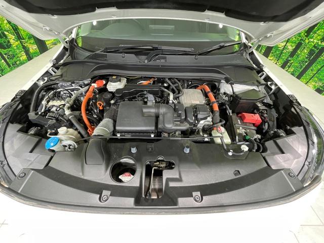 ヴェゼル ｅ：ＨＥＶ　Ｚ　純正９型ナビ　バックカメラ　寒冷地仕様　衝突被害軽減システム　レーダークルーズ　禁煙車　電動リアゲート　ハーフレザーシート　コーナーセンサー　シートヒーター　ＬＥＤヘッド　ＥＴＣ２．０　車線逸脱警報（18枚目）