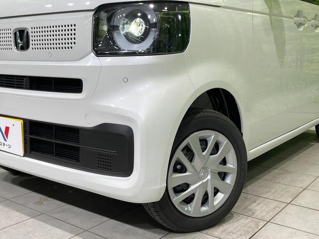 Ｎ－ＢＯＸ ベースグレード　４ＷＤ　届出済未使用車　両側電動スライドドア　衝突被害軽減システム　レーダークルーズ　コーナーセンサー　スマートキー　ＬＥＤヘッド　車線逸脱警報　オートライト　オートエアコン　ロールシェ－ド（13枚目）