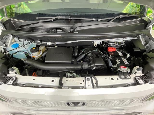 Ｎ－ＢＯＸ ベースグレード　４ＷＤ　届出済未使用車　両側電動スライドドア　衝突被害軽減システム　レーダークルーズ　コーナーセンサー　スマートキー　ＬＥＤヘッド　車線逸脱警報　オートライト　オートエアコン　ロールシェ－ド（19枚目）