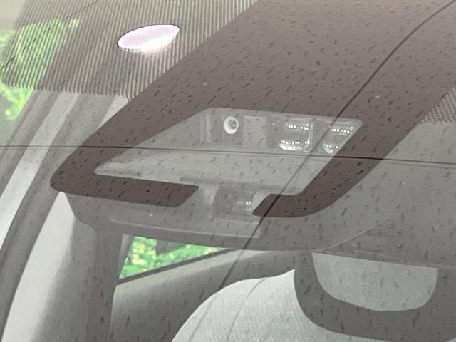 アクア L SDナビ バックカメラ 寒冷地仕様 衝突被害軽減システム 禁煙車 コーナーセンサー スマートキー オートハイビーム 車線逸脱警報 オートライト オートエアコン Bluetooth プライバシーガラス(5枚目)