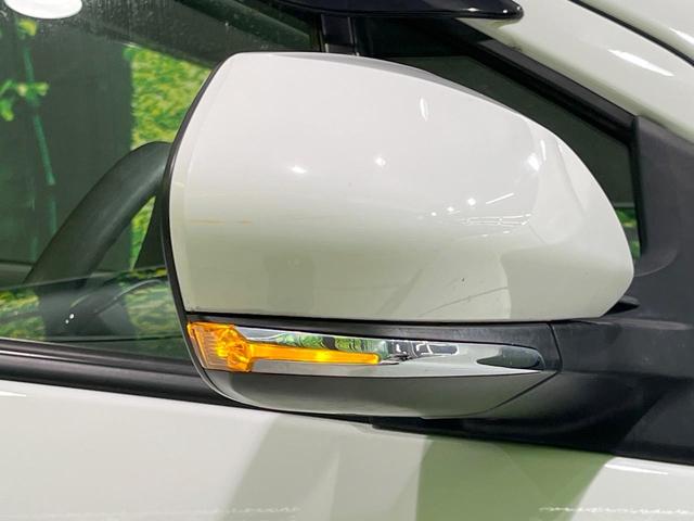 アクア L SDナビ バックカメラ 寒冷地仕様 衝突被害軽減システム 禁煙車 コーナーセンサー スマートキー オートハイビーム 車線逸脱警報 オートライト オートエアコン Bluetooth プライバシーガラス(23枚目)