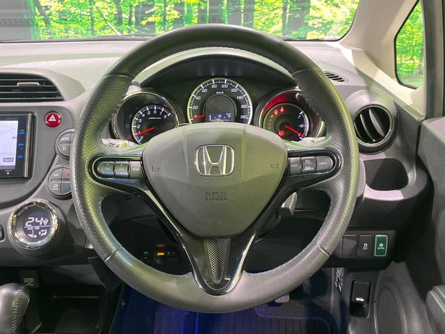 フィットシャトル 15Xクールエディション 純正SDナビ バックカメラ 禁煙車 ハーフレザーシート スマートキー HIDヘッド ビルトインETC クルーズコントロール オートライト オートエアコン Bluetooth CD DVD再生 フルセグ(11枚目)