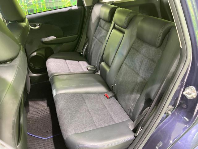 フィットシャトル 15Xクールエディション 純正SDナビ バックカメラ 禁煙車 ハーフレザーシート スマートキー HIDヘッド ビルトインETC クルーズコントロール オートライト オートエアコン Bluetooth CD DVD再生 フルセグ(23枚目)