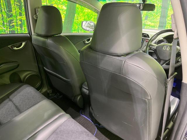 フィットシャトル 15Xクールエディション 純正SDナビ バックカメラ 禁煙車 ハーフレザーシート スマートキー HIDヘッド ビルトインETC クルーズコントロール オートライト オートエアコン Bluetooth CD DVD再生 フルセグ(26枚目)