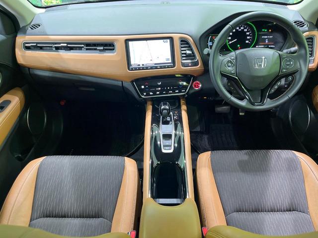 ヴェゼル ハイブリッドZ・ホンダセンシング 純正8型SDナビ バックカメラ 衝突被害軽減システム アダプティブクルーズ 禁煙車 レザーシート ドラレコ スマートキー LEDヘッド ビルトインETC オートハイビーム 車線逸脱警報 オートライト(2枚目)