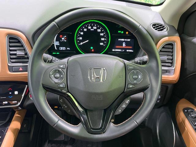 ヴェゼル ハイブリッドZ・ホンダセンシング 純正8型SDナビ バックカメラ 衝突被害軽減システム アダプティブクルーズ 禁煙車 レザーシート ドラレコ スマートキー LEDヘッド ビルトインETC オートハイビーム 車線逸脱警報 オートライト(12枚目)