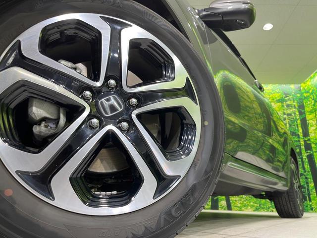 ヴェゼル ハイブリッドZ・ホンダセンシング 純正8型SDナビ バックカメラ 衝突被害軽減システム アダプティブクルーズ 禁煙車 レザーシート ドラレコ スマートキー LEDヘッド ビルトインETC オートハイビーム 車線逸脱警報 オートライト(14枚目)