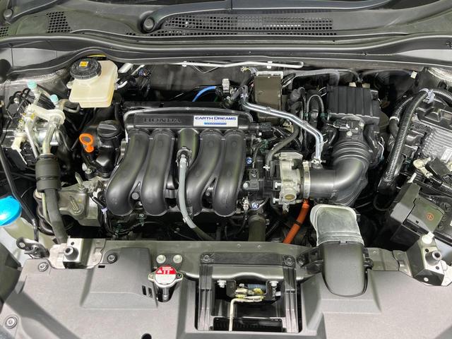 ヴェゼル ハイブリッドZ・ホンダセンシング 純正8型SDナビ バックカメラ 衝突被害軽減システム アダプティブクルーズ 禁煙車 レザーシート ドラレコ スマートキー LEDヘッド ビルトインETC オートハイビーム 車線逸脱警報 オートライト(19枚目)