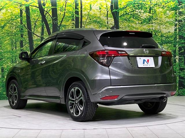 ヴェゼル ハイブリッドZ・ホンダセンシング 純正8型SDナビ バックカメラ 衝突被害軽減システム アダプティブクルーズ 禁煙車 レザーシート ドラレコ スマートキー LEDヘッド ビルトインETC オートハイビーム 車線逸脱警報 オートライト(64枚目)