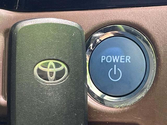 エスクァイア ハイブリッドＧｉ　両側電動スライド　純正９型ナビ　バックカメラ　衝突被害軽減システム　禁煙車　ハーフレザーシート　クルコン　ＬＥＤヘッド　ビルトインＥＴＣ　オートライト　オートエアコン　純正１５インチアルミ（7枚目）