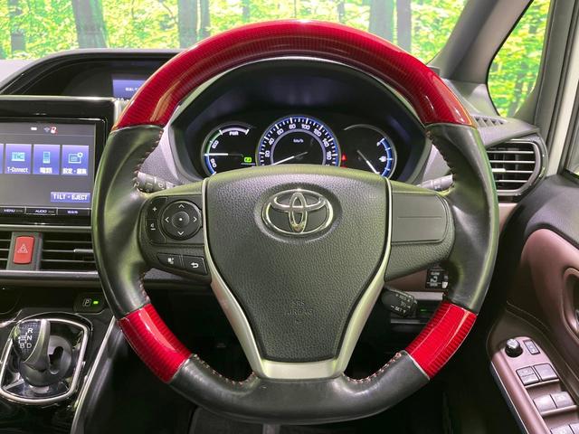 エスクァイア ハイブリッドＧｉ　両側電動スライド　純正９型ナビ　バックカメラ　衝突被害軽減システム　禁煙車　ハーフレザーシート　クルコン　ＬＥＤヘッド　ビルトインＥＴＣ　オートライト　オートエアコン　純正１５インチアルミ（12枚目）