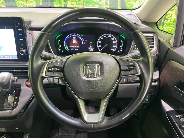 オデッセイハイブリッド e:HEVアブソルート・EX 両側電動スライドドア 純正9型SDナビ 後席モニター 全周囲カメラ 衝突被害軽減システム レーダークルーズ 電動リアゲート レザーシート コーナーセンサー LEDヘッド ETC2.0 車線逸脱警報(12枚目)