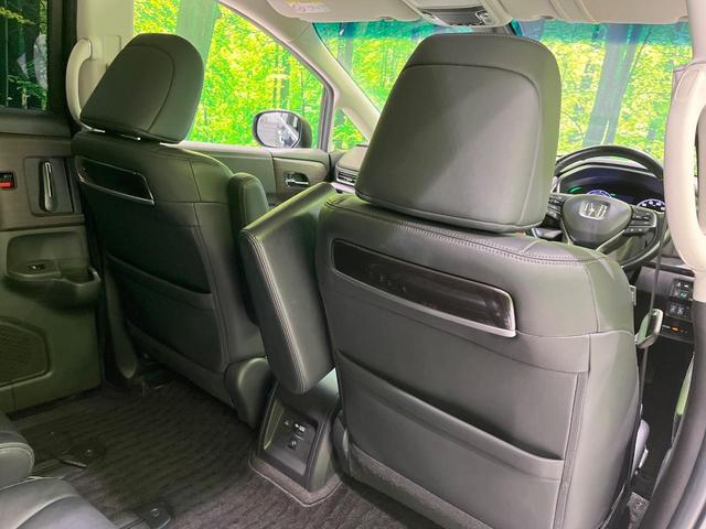 オデッセイハイブリッド e:HEVアブソルート・EX 両側電動スライドドア 純正9型SDナビ 後席モニター 全周囲カメラ 衝突被害軽減システム レーダークルーズ 電動リアゲート レザーシート コーナーセンサー LEDヘッド ETC2.0 車線逸脱警報(37枚目)