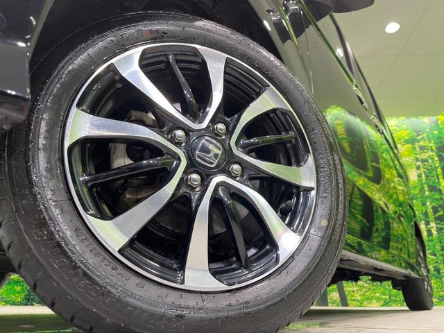 N-BOXカスタム G・Lホンダセンシング 4WD 電動スライドドア 純正SDナビ バックカメラ 衝突被害軽減システム レーダークルーズ 禁煙車 コーナーセンサー スマートキー LEDヘッド ビルトインETC 車線逸脱警報 オートライト(14枚目)