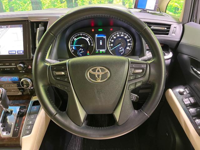 アルファードハイブリッド Ｘ　４ＷＤ　両側電動スライド　純正９型ディスプレイオーディオ　バックカメラ　ＪＢＬサウンド　寒冷地仕様　１００Ｖ電源　衝突被害軽減システム　レーダークルーズ　禁煙車　ドラレコ　ＬＥＤヘッド（9枚目）