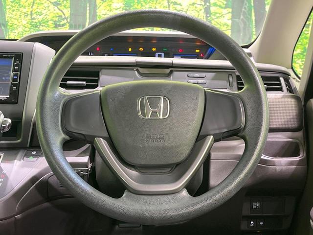 フリード Ｂ　４ＷＤ　６人乗　純正ナビ　バックカメラ　寒冷地仕様　禁煙車　ドラレコ　スマートキー　シートヒーター　ＥＴＣ　オートエアコン　両側スライドドア　Ｂｌｕｅｔｏｏｔｈ　ＣＤ　ＤＶＤ再生　フルセグ（9枚目）