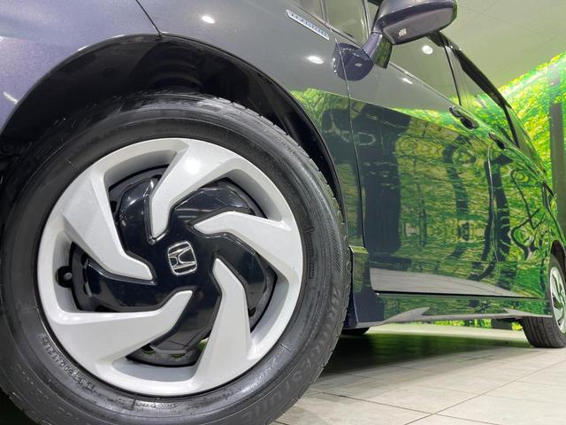 フリードスパイクハイブリッド ジャストセレクション 純正ナビ バックカメラ 両側パワースライドドア クルーズコントロール ETC HIDヘッドライト オートエアコン ステアリングスイッチ 地デジ ハーフレザーシート(13枚目)