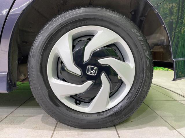 フリードスパイクハイブリッド ジャストセレクション 純正ナビ バックカメラ 両側パワースライドドア クルーズコントロール ETC HIDヘッドライト オートエアコン ステアリングスイッチ 地デジ ハーフレザーシート(55枚目)