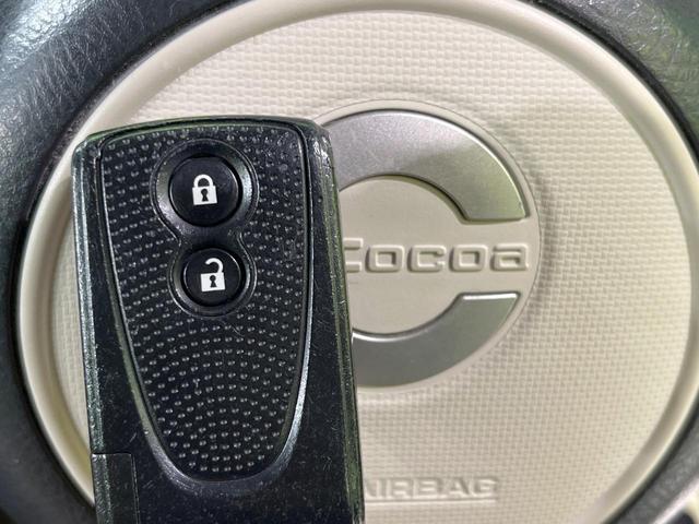 ミラココア ココアX SDナビ バックカメラ 禁煙車 スマートキー オートエアコン CD DVD再生 地デジ アイドリングストップ ドアバイザー プライバシーガラス(6枚目)