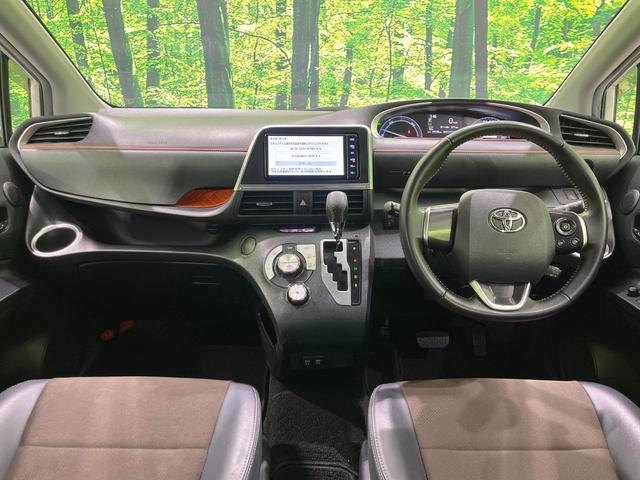 シエンタ ハイブリッドG クエロ 両側電動ドア 純正SDナビ バックカメラ 衝突被害軽減システム 禁煙車 ハーフレザーシート コーナーセンサー スマートキー LEDヘッド クルコン オートハイビーム 車線逸脱警報 オートライト(2枚目)