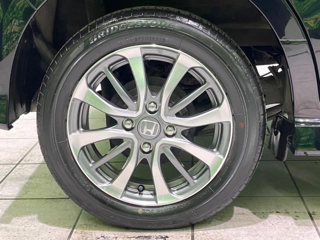 N-BOXカスタム L 4WD 両側電動ドア 純正SDナビ バックカメラ 衝突被害軽減システム コーナーセンサー スマートキー LEDヘッド 純正14インチアルミ オートハイビーム 車線逸脱警報 オートライト(62枚目)