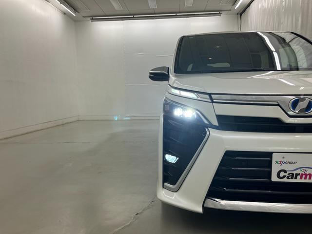 ヴォクシー ハイブリッドＺＳ　煌ＩＩ　ＬＥＤヘッドライト　純正ＳＤナビ　フルセグＴＶ　ＣＤ／ＤＶＤ再生　ＷｉＦｉ接続　　　Ｂｌｕｅｔｏｏｔｈ接続　両側電動スライドドア　バックモニター　ＥＴＣ　ドライブレコーダー　純正１５インチアルミ（48枚目）