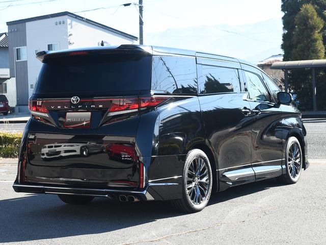 ヴェルファイアハイブリッド Z プレミア モデリスタフルエアロ 禁煙車 冬タイヤ・アルミ有 ユニバーサルステップ デジタルインナーミラー 革シート 全周囲カメラ ツインルーフ HUD 盗難防止装置 スマートキー ナビTV 両側電動スライドドア(5枚目)