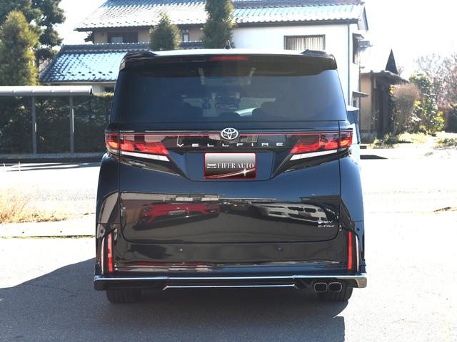 ヴェルファイアハイブリッド Z プレミア モデリスタフルエアロ 禁煙車 冬タイヤ・アルミ有 ユニバーサルステップ デジタルインナーミラー 革シート 全周囲カメラ ツインルーフ HUD 盗難防止装置 スマートキー ナビTV 両側電動スライドドア(6枚目)