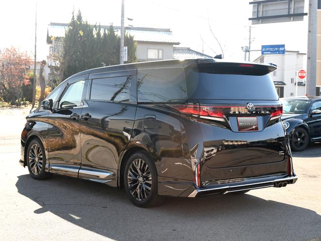 ヴェルファイアハイブリッド Z プレミア モデリスタフルエアロ 禁煙車 冬タイヤ・アルミ有 ユニバーサルステップ デジタルインナーミラー 革シート 全周囲カメラ ツインルーフ HUD 盗難防止装置 スマートキー ナビTV 両側電動スライドドア(7枚目)