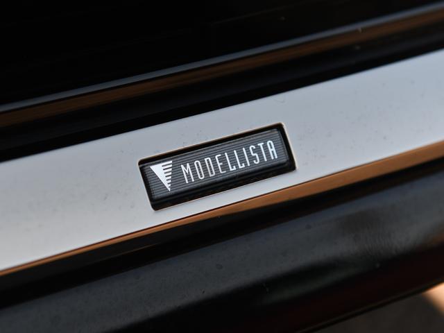 ヴェルファイアハイブリッド Z プレミア モデリスタフルエアロ 禁煙車 冬タイヤ・アルミ有 ユニバーサルステップ デジタルインナーミラー 革シート 全周囲カメラ ツインルーフ HUD 盗難防止装置 スマートキー ナビTV 両側電動スライドドア(12枚目)