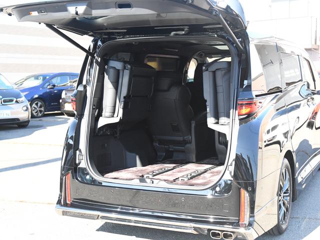 ヴェルファイアハイブリッド Z プレミア モデリスタフルエアロ 禁煙車 冬タイヤ・アルミ有 ユニバーサルステップ デジタルインナーミラー 革シート 全周囲カメラ ツインルーフ HUD 盗難防止装置 スマートキー ナビTV 両側電動スライドドア(67枚目)