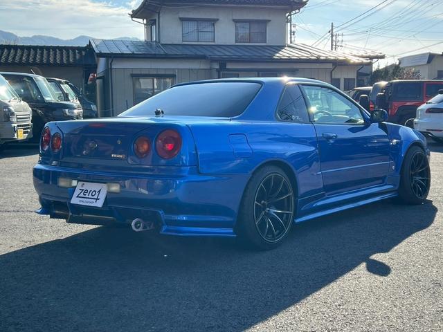 スカイライン ２５ＧＴターボ　フロントリアサイドユーラスエアロ　ＨＫＳ車高調マフラー　ニスモデフ　トラスト製インタークーラーオイルクーラーエアクリ　ナルディステアリング　レカロフルバケ（4枚目）