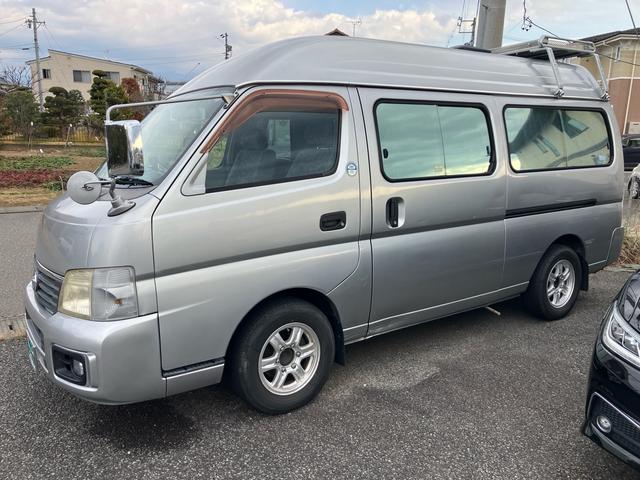 キャラバン 　キャンピングカー　８人乗り　車検整備付　ソーラーパネル　ナビ　バックカメラ　ＴＶ　ＥＴＣ　キーレス　スライドドア（手動）　ＬＥＤヘッドライト　フロントフォグランプ　スタッドレスタイヤ＆アルミホイール有（6枚目）