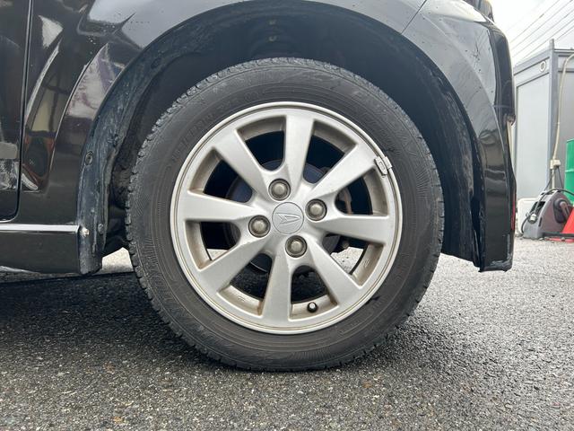 ムーヴ カスタム　Ｘリミテッド　パワーステアリング／パワーウィンドウ／ＣＤ／オーディオ／ＡＭ・ＦＭラジオ／ＡＢＳ／フルフラット／衝突安全ボディ／盗難防止システムエアコン／キーレスエントリー／（54枚目）