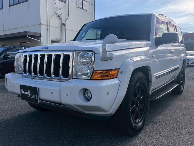ジープ・コマンダー リミテッド５．７　ＨＥＭＩ　４ＷＤ・社外ナビ・ダブルサンルーフ・クルコン・シガーソケット・シートメモリ・パワーシート・前席シートヒーター・電格ミラー・コーナーセンサー・横滑り防止・パワーウィンドウ・フォグランプ・Ｖ８エンジン（2枚目）
