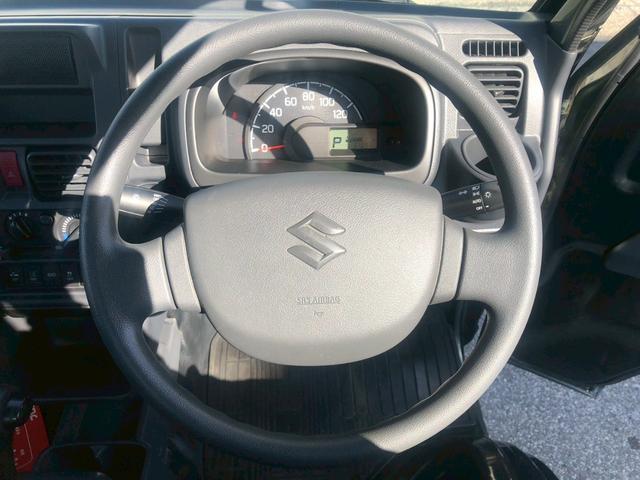 キャリイトラック KCスペシャル 4WD・純正ラジオデッキ・デュアルカメラブレーキサポート・車線逸脱防止・ドライブレコーダー・パワーウィンドウ・エアコン・横滑り防止・ヘッドライトレベライザー・シガーソケット・灰皿(15枚目)