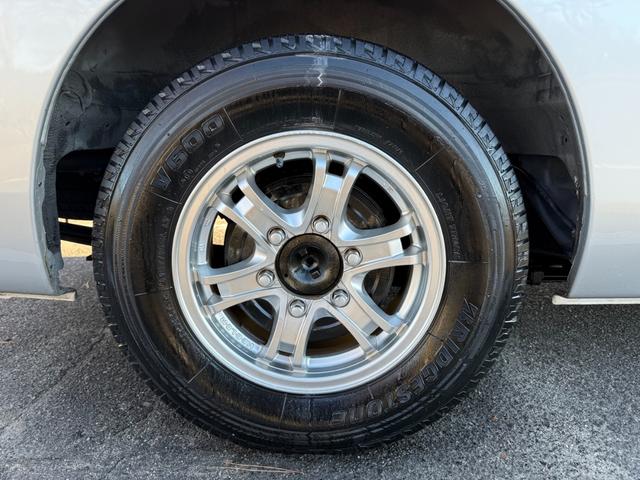 ＮＶ３５０キャラバンバン ロングＤＸターボ　切替４ＷＤ　ディーゼルターボ　オートマ　５ドア　６人乗り　フォグランプ　キーレスエントリー　ＥＴＣ　ヘッドライトレベライザー　純正ナビ　ＴＶ　バックカメラ　プライバシーガラス　関東仕入　ＡＢＳ　ＰＷ（36枚目）