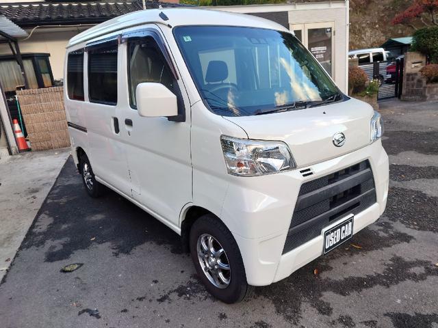 ハイゼットカーゴ クルーズSAIII パートタイム4WD アイドルストップ キ-レス 電動格納式ドアミラー ナビ バックアイカメラ ETC車載器 エアバック ABS 横滑り防止 デュアルエアバッグ マニュアルエアコン(3枚目)