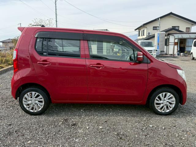 ワゴンＲ ＦＸリミテッド　４ＷＤ　ナビ　バックモニター　ＥＴＣ　フルセグＴＶ　スマートキープッシュスタート　オートエアコン　パワーステアリング　パワーウインドウ　エアバック　ベンチシート　シートヒーター　純正アルミホイール（4枚目）