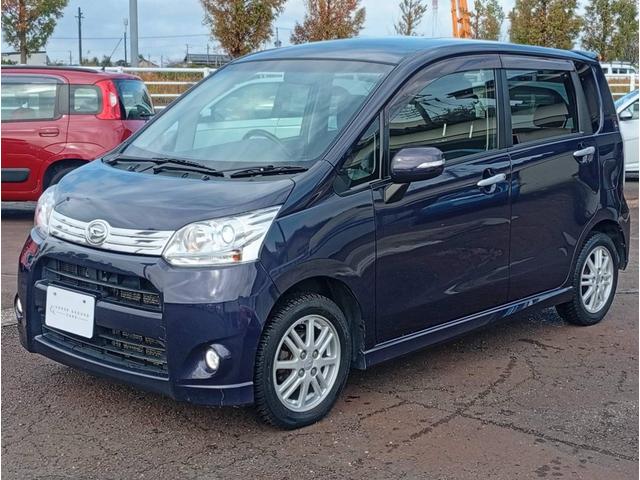 ムーヴ カスタム　ＲＳ　４ＷＤ　ターボ　ダイハツ純正１４インチＡＷ　スマートキー　ｍｏｍｏステアリング　オートエアコン　シート洗浄済み　純正ＨＩＤ　純正フォグ（7枚目）